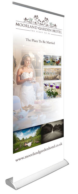 A photo of a premium roll up banner with Moorland Garden Hotel artwork
