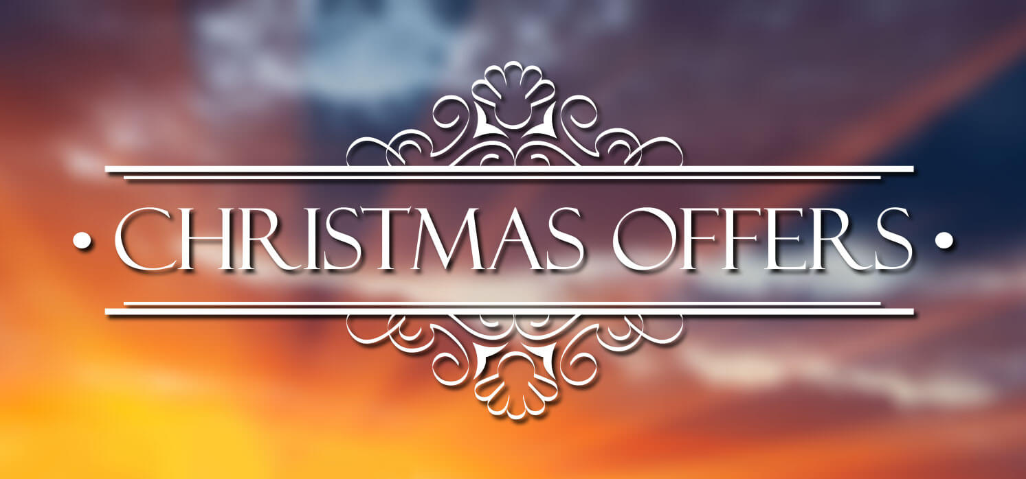 An image of a wintry sky with the words Christmas Offers