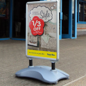 an image of the sightmaster 2 forecourt sign in use with promotional posters in place