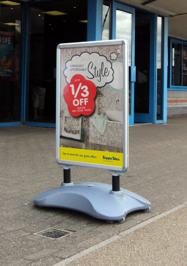 an image of the sightmaster 2 forecourt sign in use with promotional posters in place