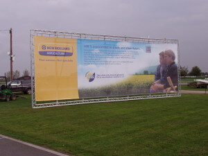 PVC mesh banners displayed in trilite supporting banner frame