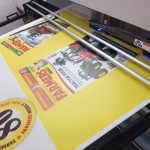 A photo of Farmers Weekly Signage for Grassland and Muck being printed