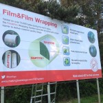 A photo of large format advertising produced for Grassland and Muck