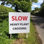A photo of Road signage for Grassland and Muck