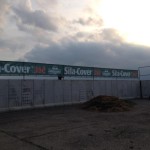 A photo of large mesh silage banners on a clamp at Grassland and Muck