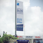 A photo of a white and blue lamp post banner produced for the Royal Cornwall Show