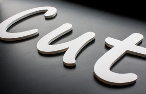 A picture of flat cut lettering produced from 10mm foamex and applied to a black backing board